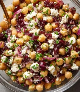 Feta and Cranberry Chickpea Salad served in a bowl with fresh ingredients