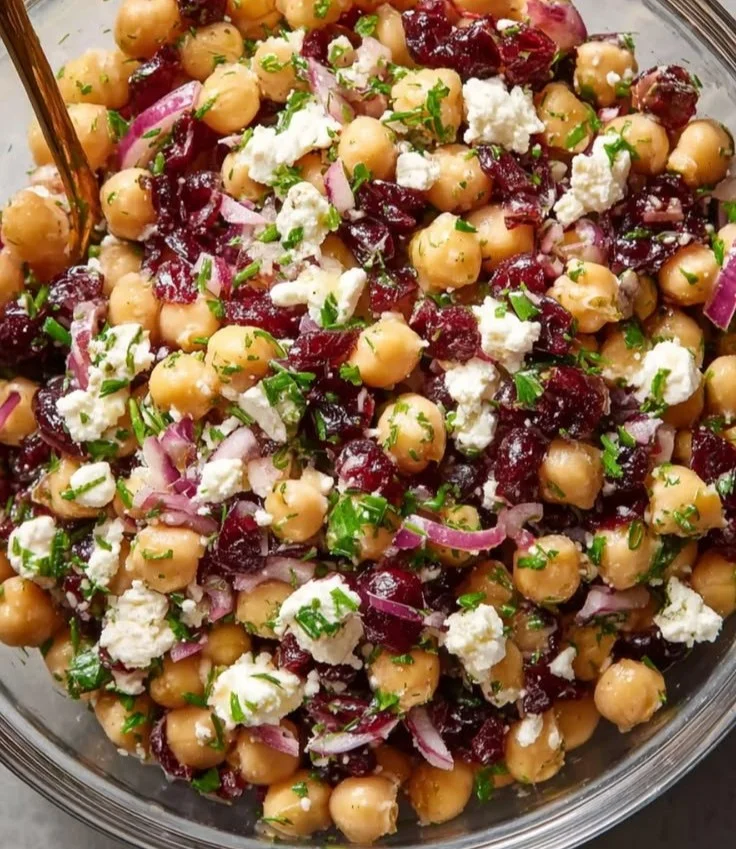 Feta and Cranberry Chickpea Salad served in a bowl with fresh ingredients