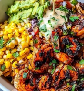 Delicious grilled shrimp bowl served with fresh vegetables and rice