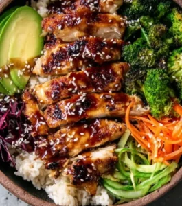 Healthy Sticky Chicken Bowls with vibrant vegetables and a savory glaze