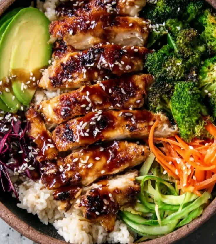 Healthy Sticky Chicken Bowls with vibrant vegetables and a savory glaze