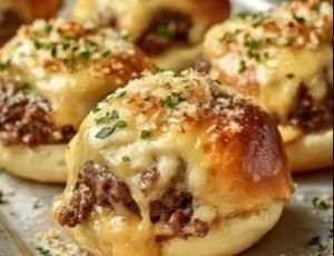 Mini Big Mac Cheeseburgers served on a plate with garnish