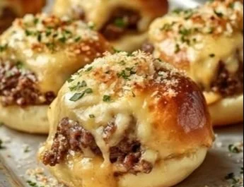 Mini Big Mac Cheeseburgers served on a plate with garnish