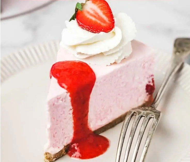 No-Bake Strawberry Cheesecake topped with fresh strawberries