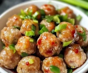 Delicious Asian pork and shrimp meatballs served with dipping sauce.