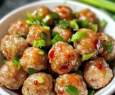 Delicious Asian pork and shrimp meatballs served with dipping sauce.