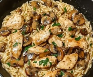 Creamy Chicken Marsala Orzo Skillet with mushrooms and herbs