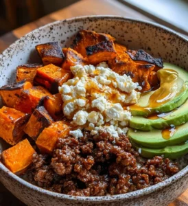 Delicious hot honey beef bowl with vegetables and rice