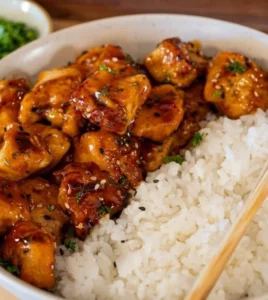 Plate of sweet chili chicken bites served with dipping sauce