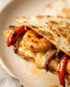 Delicious harissa shrimp quesadillas with melted cheese and fresh ingredients