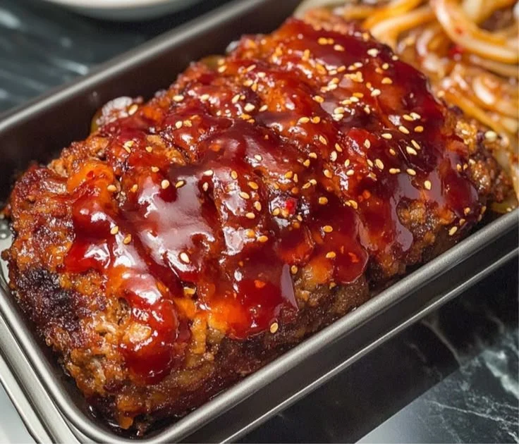 Korean Meatloaf with Gochujang Glaze served on a plate